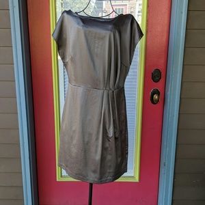 Grey satin dress with side pleat detail.